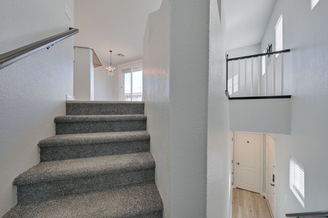 Building Photo - NW!! Gated!! Community Pool/Spa  Recreation Room!! New Paint!! New Flooring!!  Balcony!!  2 car g...