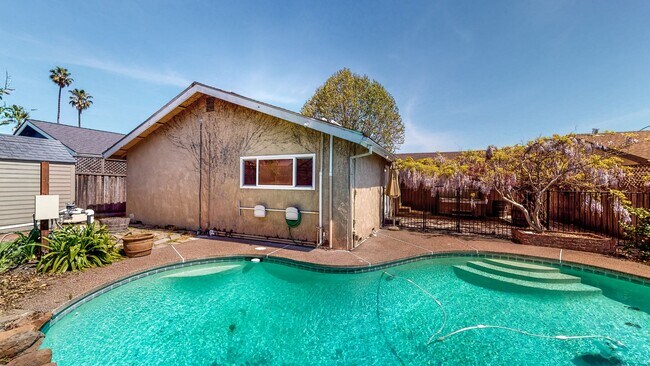 Building Photo - PURE Property Management - Stunning four-b...