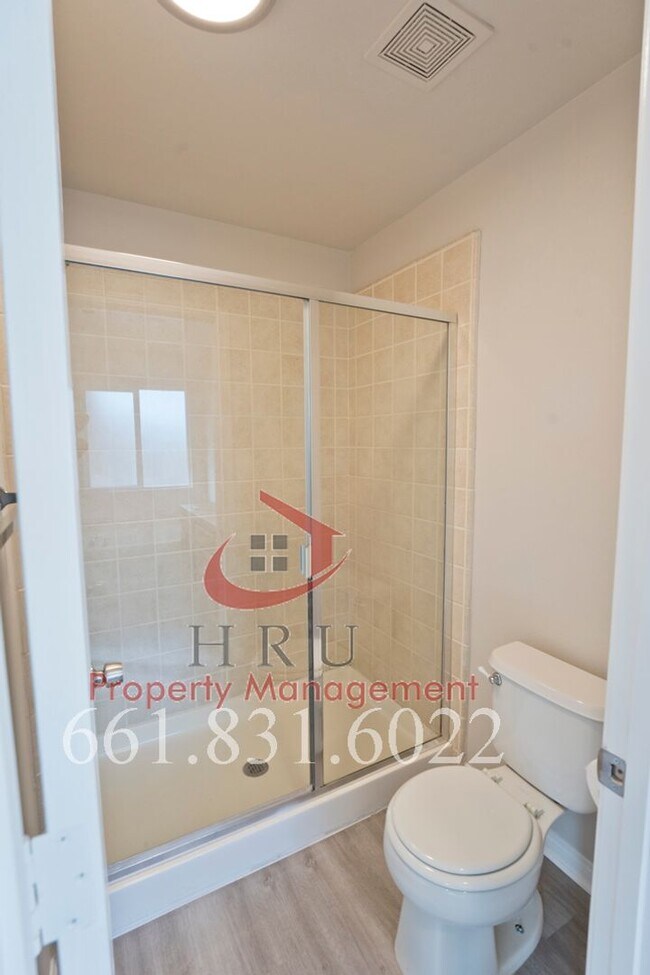 Building Photo - SW-Bakersfield  features 4 bed 2 bath with solar panels