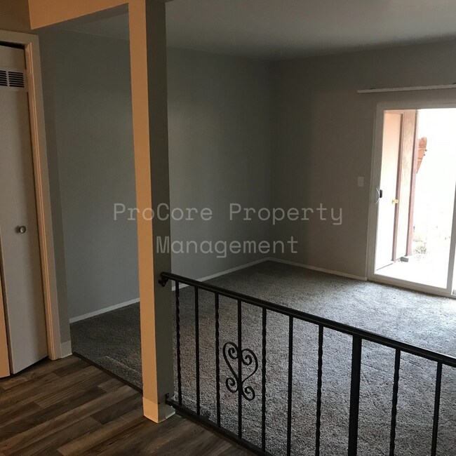 Building Photo - $1300...2Bed 1.5 Bath, Small Fenced in Covered Patio on Back, Storage
