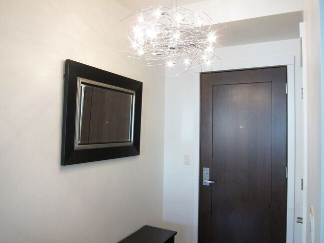 Building Photo - Stunning 2 Bedroom 2 Bath condo, with 2 Parking spots in the heart of vibrant Kirkland for Rent