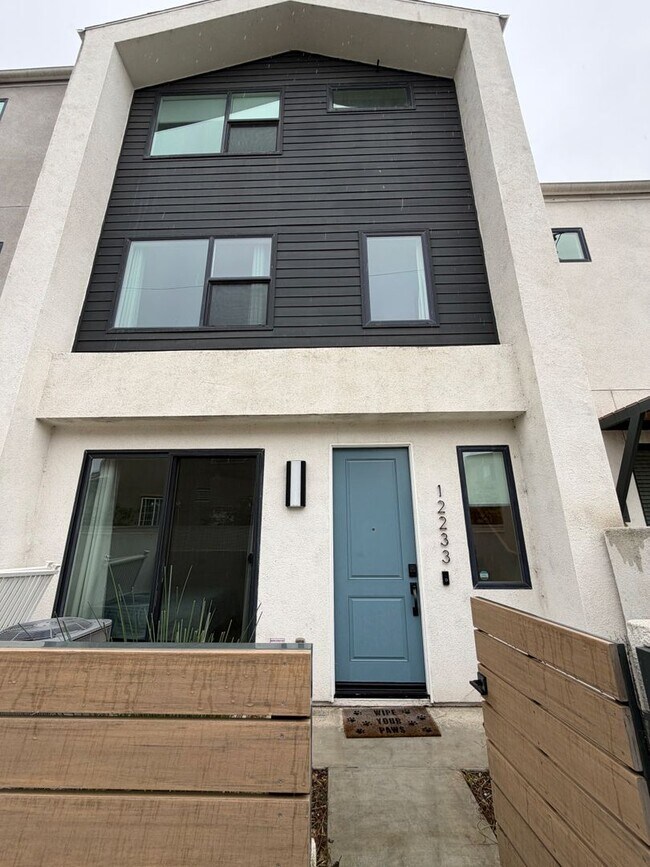 Building Photo - Smart, Modern 4-Bedroom Townhome Near Disneyland & Major Freeways