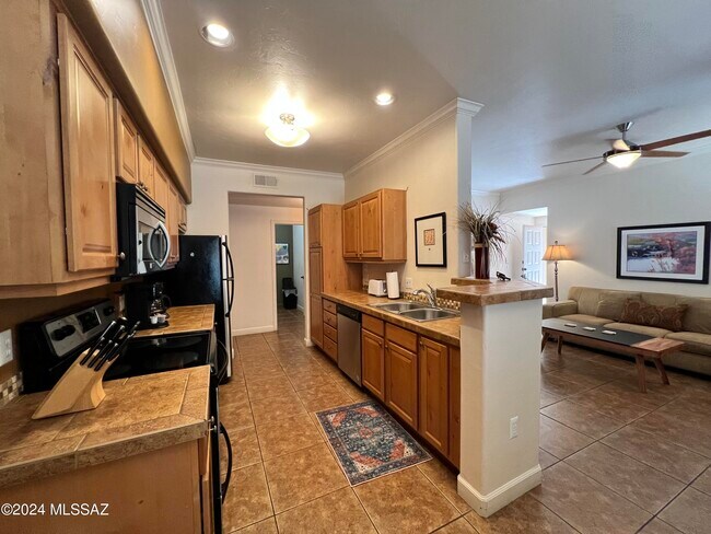 Building Photo - 7050 E Sunrise Dr