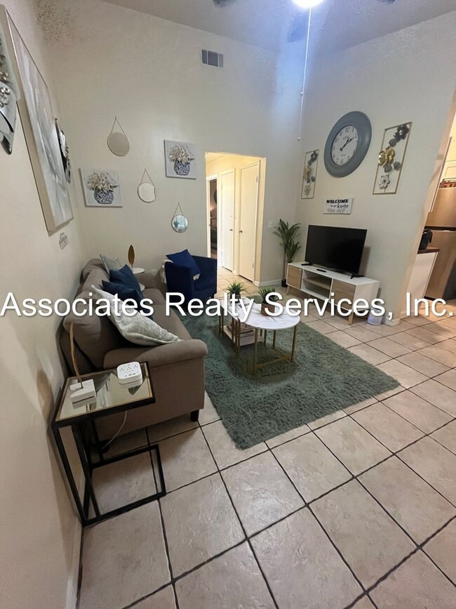 Building Photo - Beautifully furnished  2-Bedroom Duplex – ...