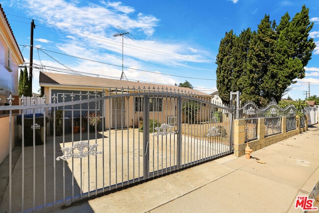 Building Photo - 16711 Mapes Ave