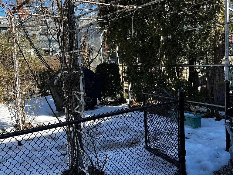 fenced in yard - 130 Sutton St