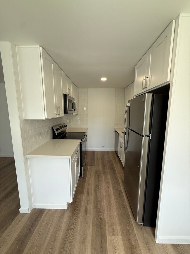 Building Photo - Tastefully Updated Ranier Beach 2bd 1bath Duplex unit!