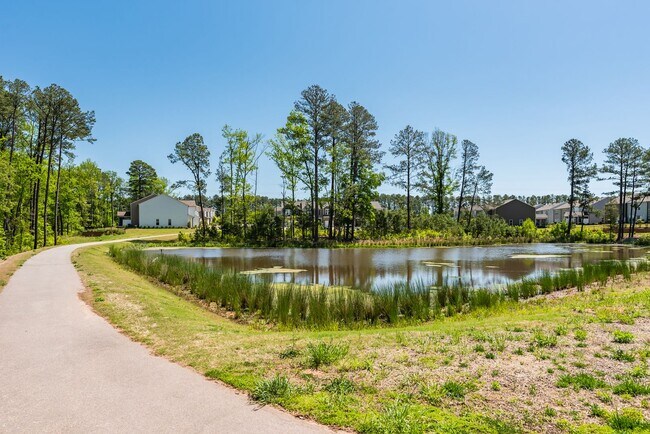 Building Photo - End unit townhome loaded with upgrades close to RTP! Available: Now