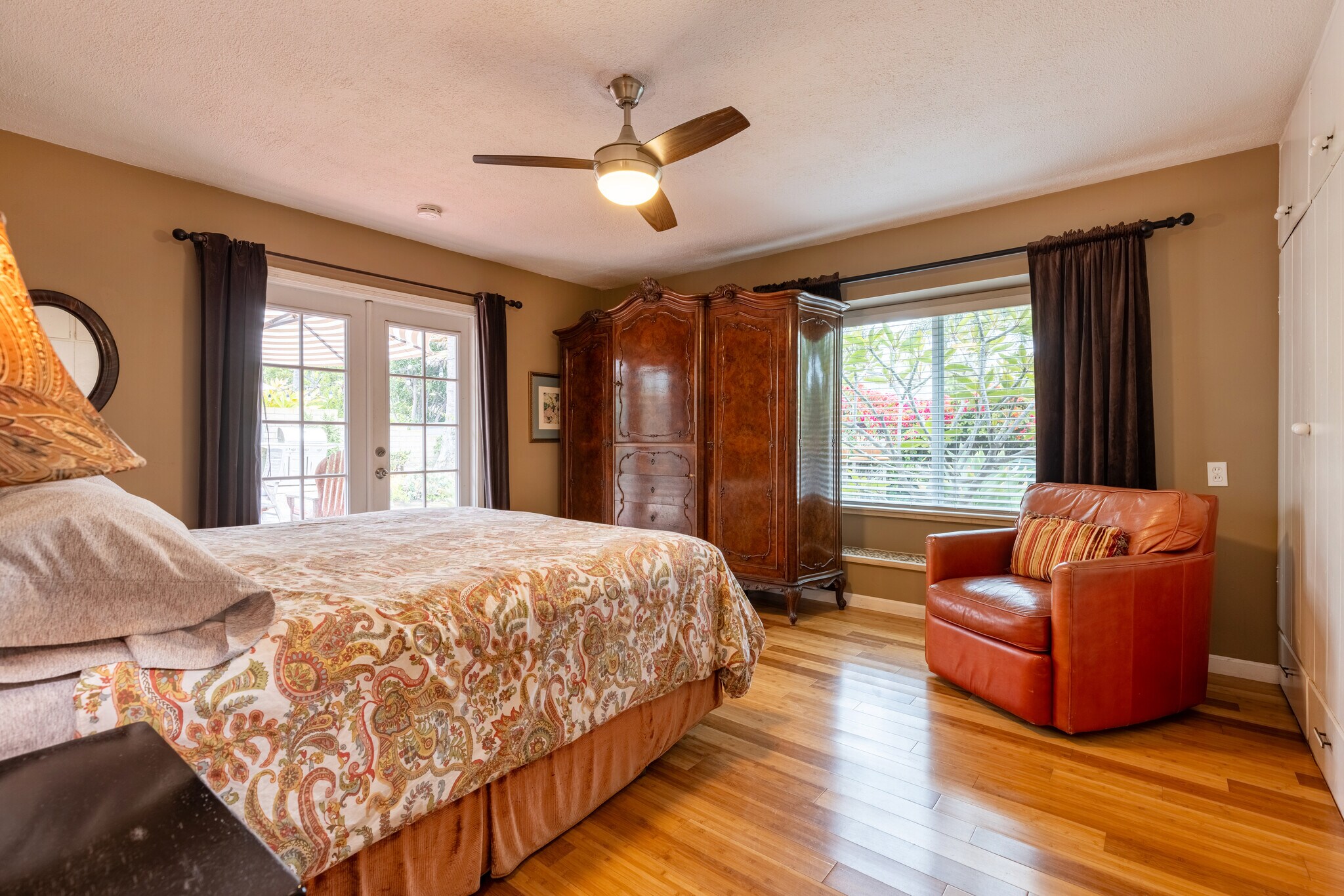 Main bedroom with king bed with French doorsto patio - 805 Regal Rd