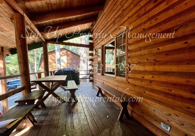 Building Photo - Rustic Retreat: Charming 1-Bedroom Log Cab...