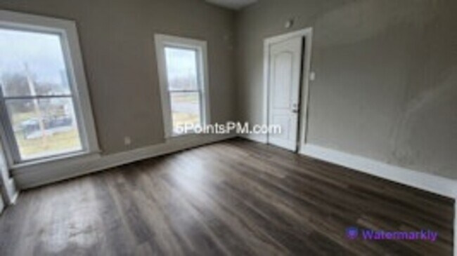 Building Photo - 9804 Miles Ave