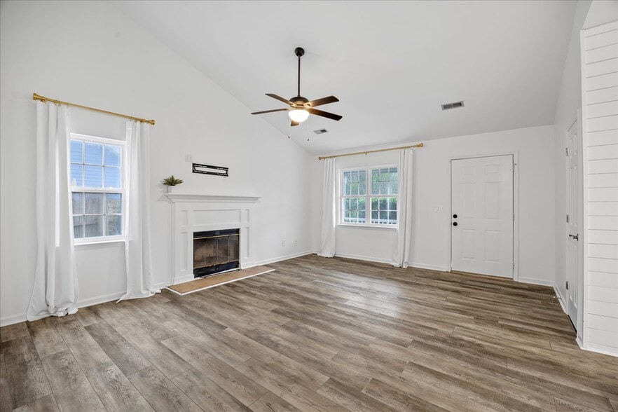 Great room with wood burning fireplace - 2204 Loblolly Ct