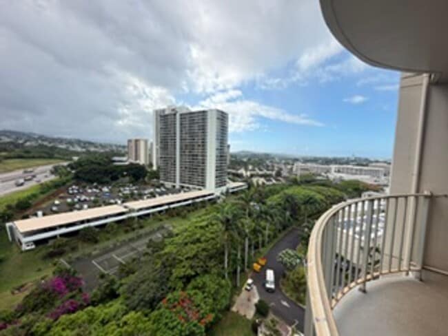 Building Photo - Welcome to your new home at Pearlridge Gardens & Tower! This 1-bedroom, 1-bathroom condo $2,100
