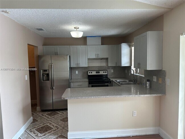 Building Photo - 6991 NW 169th Terrace