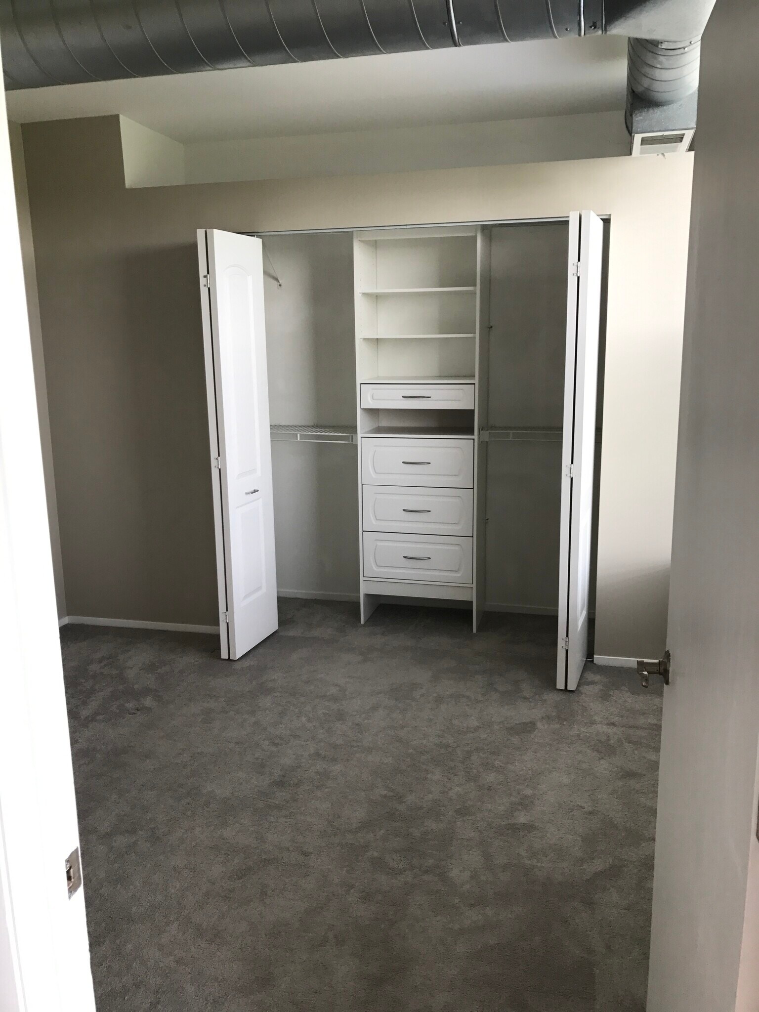 Second bedroom closet with an organizer - 811 S Lytle St