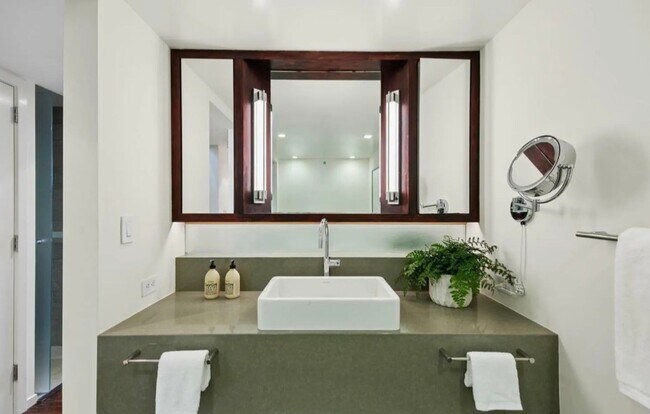 Building Photo - One-of-a-Kind Sophisticated Top-Floor Cond...