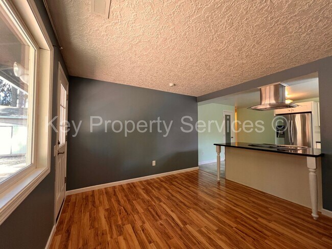 Building Photo - Orchards Ranch with Large Fenced Yard - Re...