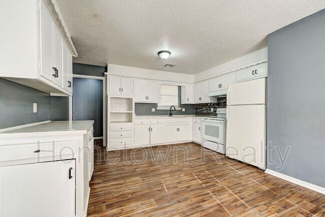 Building Photo - 8616 N Harvey Ave