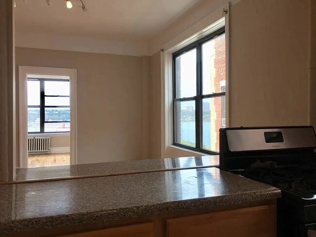 Building Photo - "Charming 1-Bedroom Retreat in Vibrant New York Locale – Your Perfect Urban Sanctuary!"