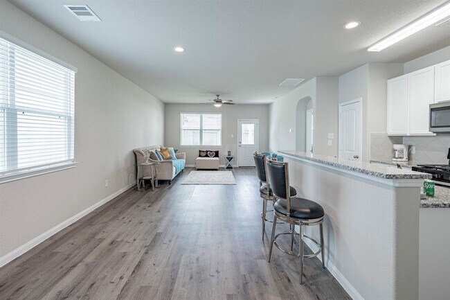 Building Photo - 4923 Blue Jacaranda Wy