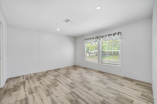 Building Photo - Experience exceptional living at its finest