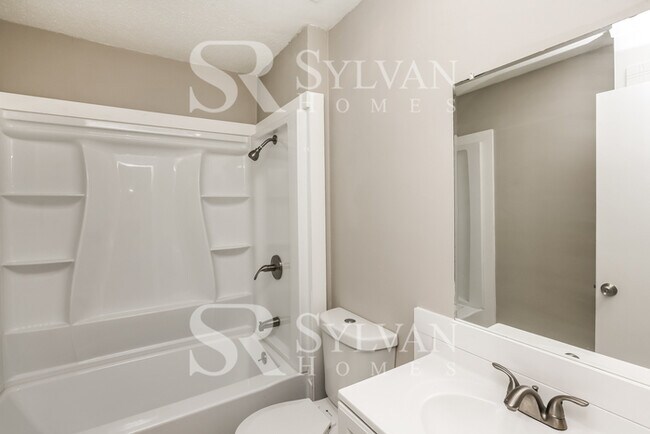 Building Photo - Lease today! No extra charge for contentme...