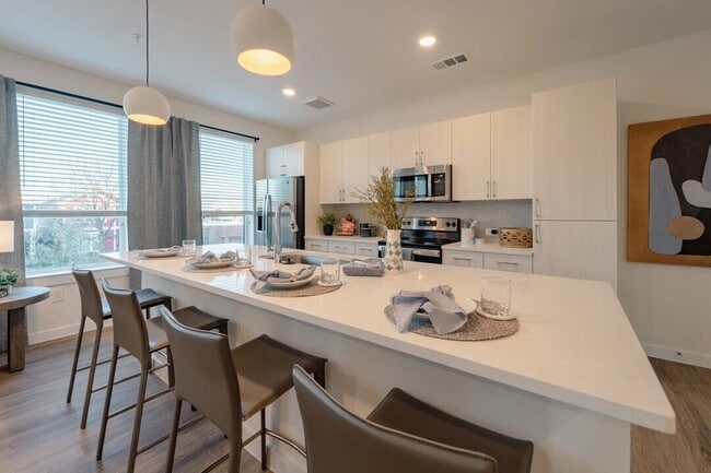 Primary Photo - Move In Without the Extra Costs!
