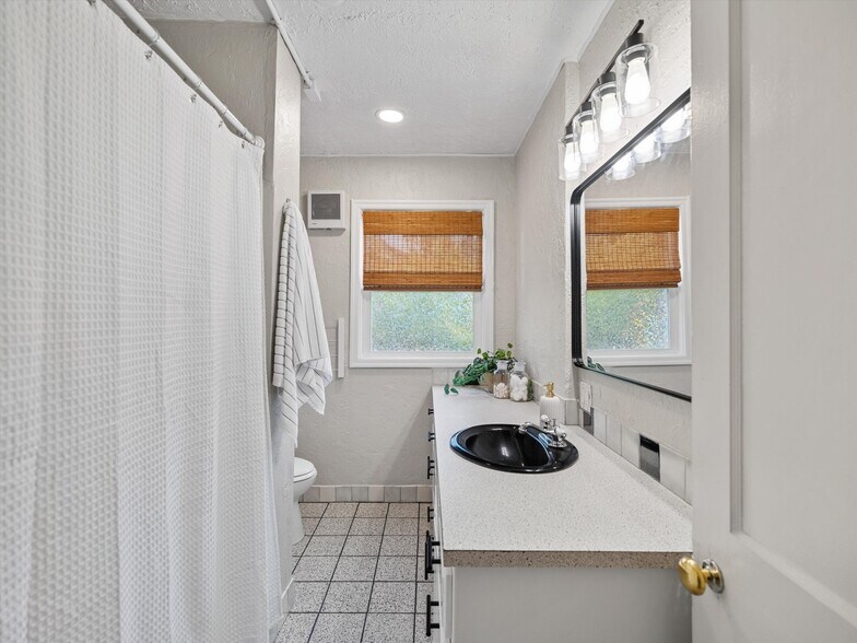 Ground floor bathroom. - 9835 SW 80th Ave