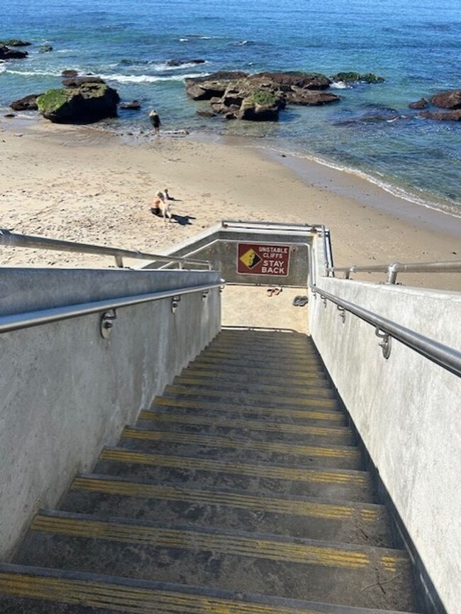 Building Photo - OCEAN EDGE , Steps from the beach ! Garage...