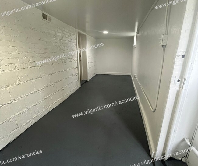 Building Photo - 1677 W 14th Ave