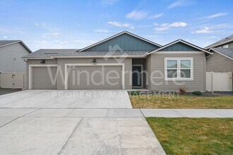 Building Photo - Welcome to this stunning 4-bedroom, 2-bathroom home located in the heart of Spokane, WA.