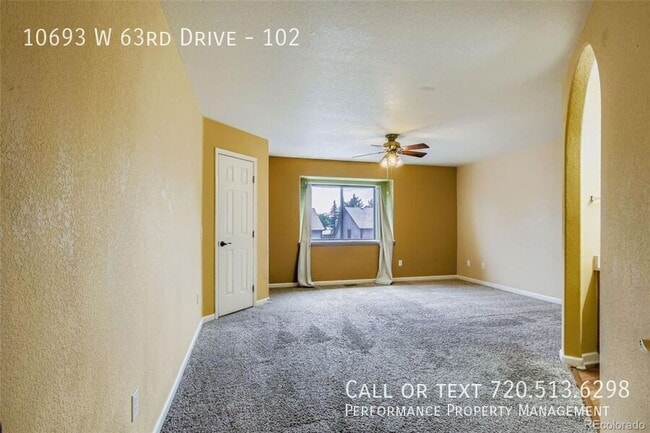 Building Photo - 10693 W 63rd Dr