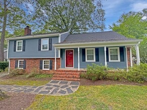 Building Photo - Spacious 4BR/2.5BA Home in Prime West End ...