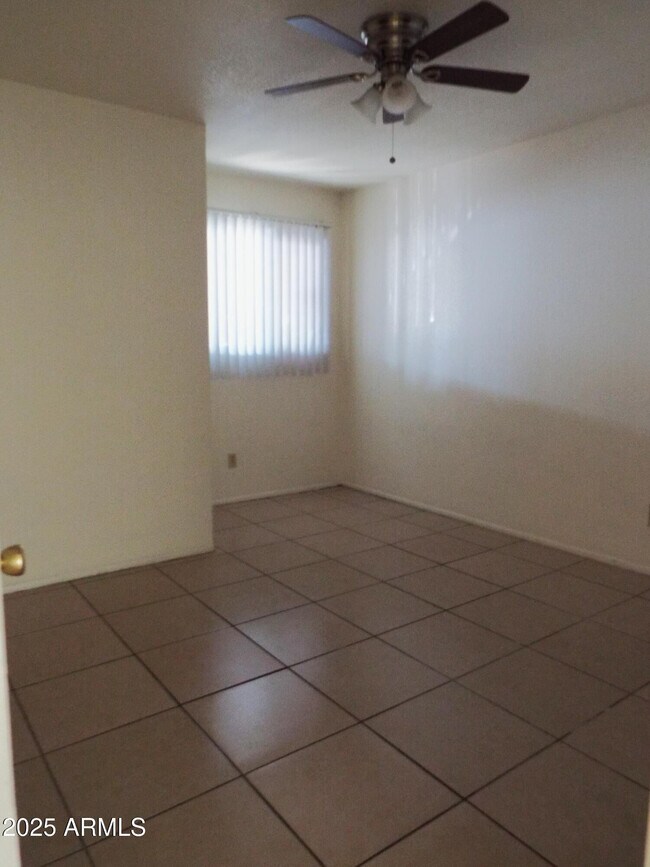 Building Photo - 6713 W Palmaire Ave