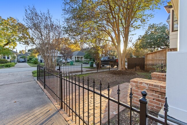 View from driveway to W 17th street. Quiet, green, peaceful setting - 515 W 17th St