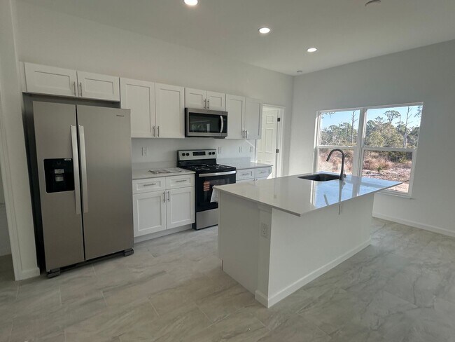 Building Photo - BRAND NEW CONSTRUCTION- 4 Bedroom 2 Bath-2 Car Garage-Serene Lake Placid Location