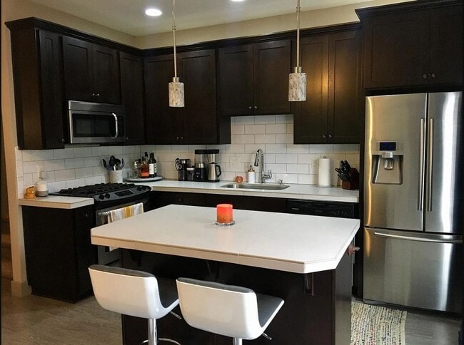Building Photo - Arbor Lodge Neighborhood Townhome with Central A/C, Garage, In-Unit Laundry, Fenced Backyard