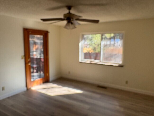 Building Photo - One level cabin with fenced backyard and garage