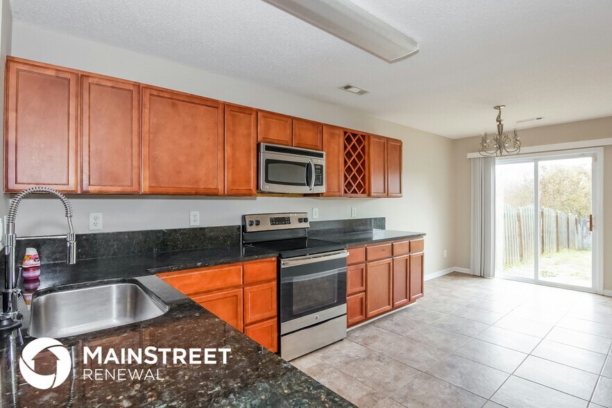 Building Photo - 6138 Sid Crane Dr