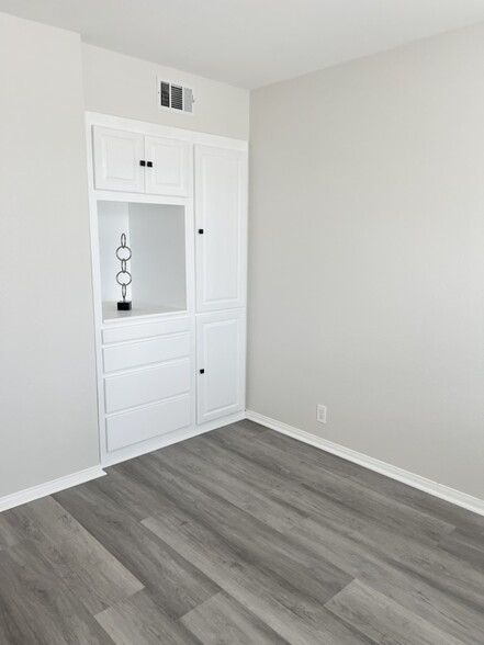 Bedroom 2 with built-in closet - 1857 W Falmouth Ave