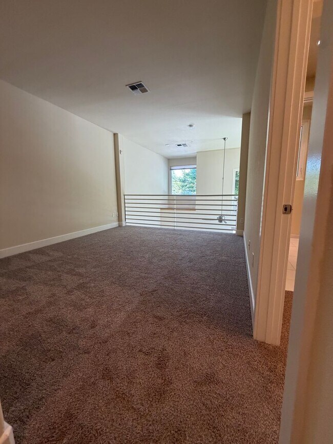 Building Photo - 7034-7046 Santero Way Lofts