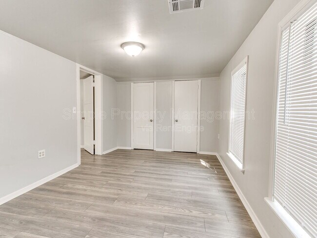 Building Photo - 9706 N Garnett Dr