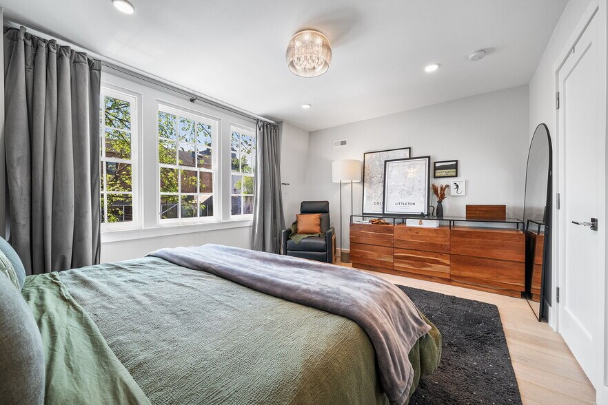 Sunlit primary bedroom. - 811 E St SE
