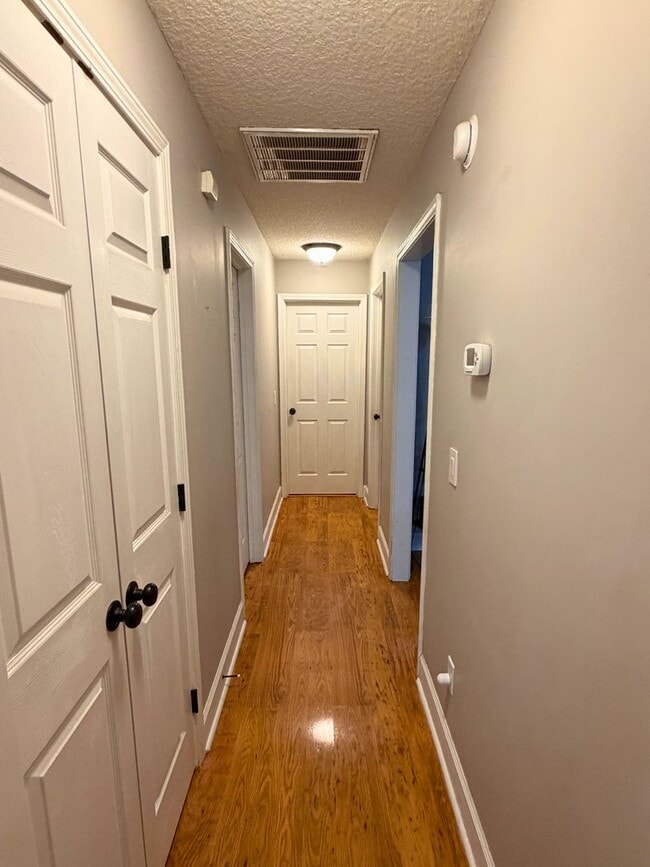 Building Photo - 4/2 with a LARGE fenced in yard!