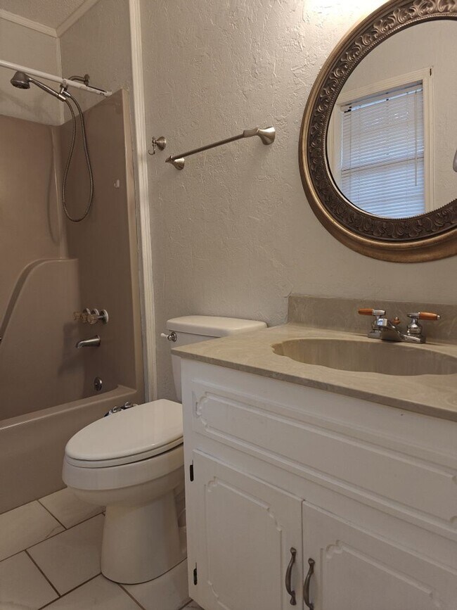 Building Photo - Elegant & Spacious 3-Bedroom Brick Home with Private Garage