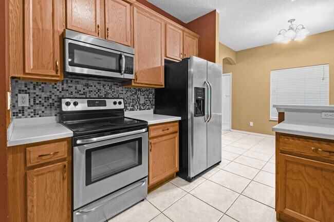 Building Photo - 6221 NW Hacienda Ln