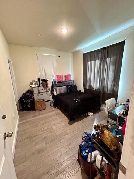 bedroom with closet and private bathroom - 1626 N Willington St