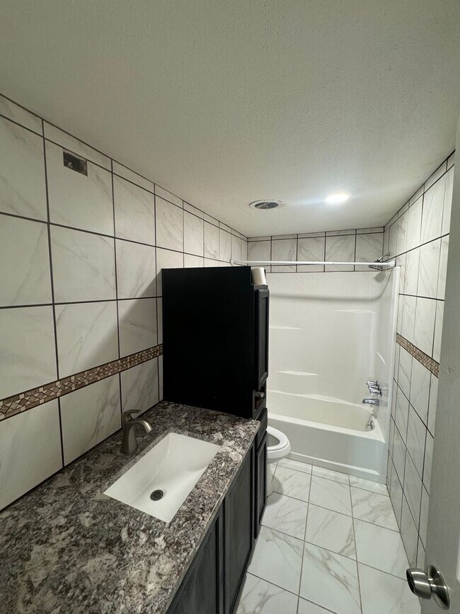 Building Photo - Non-Refundable & Security Deposit Total: $...