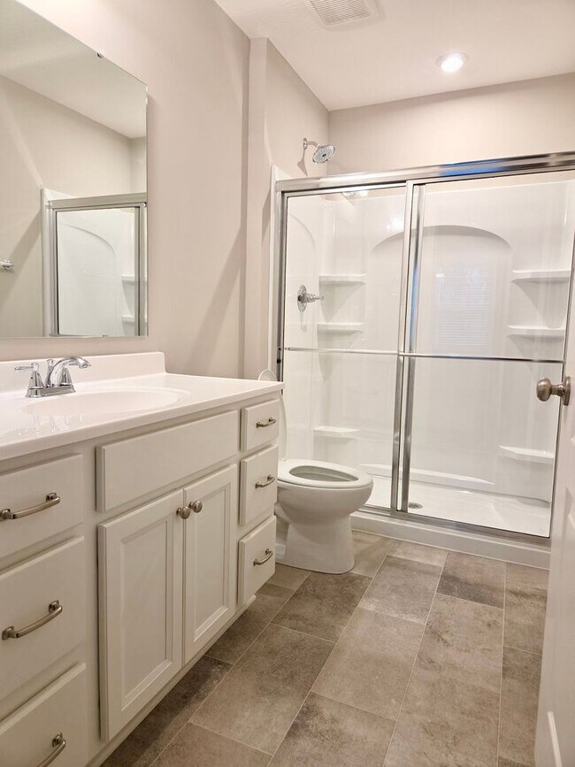 Building Photo - Exquisite just built condo with everything! Ground floor, no stairs, attached garage