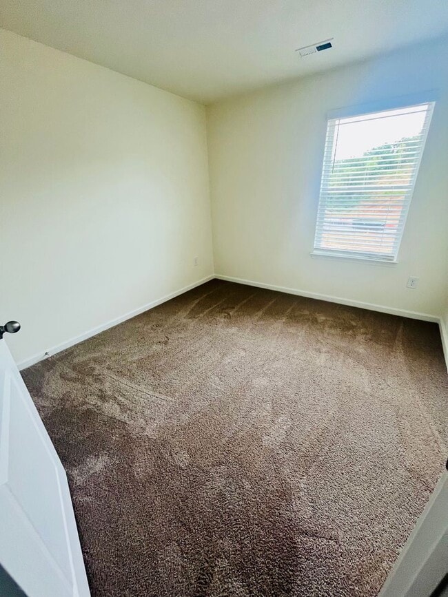 Building Photo - Be the First to Call This Brand New Townho...